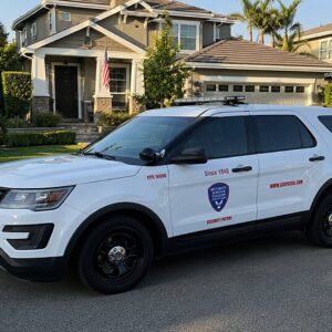 Security Service Systems patrol vehicle parked in front of a Westside Los Angeles home